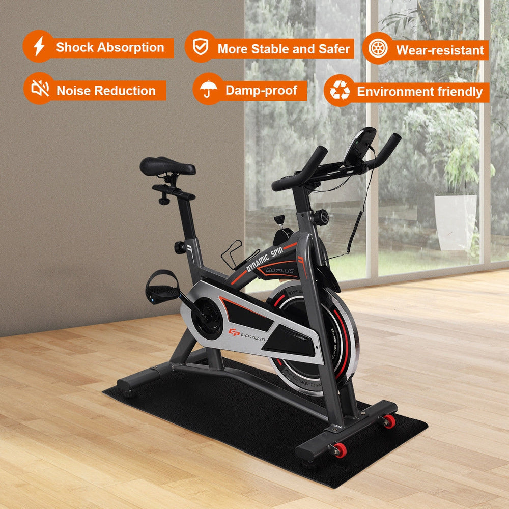 High-density PVC equipment mat, 47 x 24 x 0.3 inches, for noise reduction and shock absorption under exercise bikes.