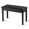 Black solid wood piano bench with a sleek design, featuring a padded seat and foot pads to protect floors from.