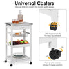 Kitchen island cart with stainless steel top, pull-out drawer, and swivel casters for easy mobility and stability.