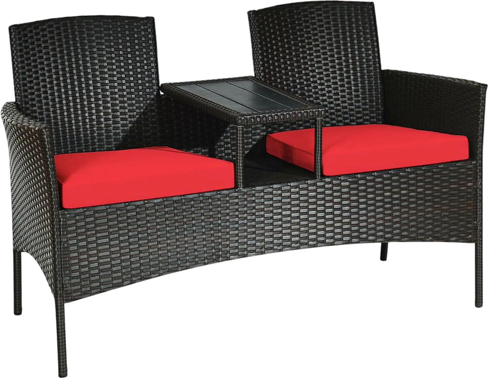 Curved two-seat patio loveseat with red cushions and practical coffee table, crafted from durable rattan for outdoor.