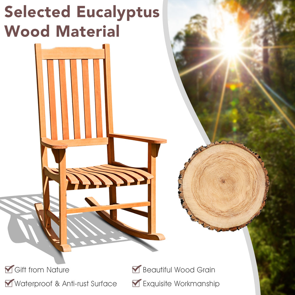 Eucalyptus wood outdoor rocking chair with contoured slatted seat and widened armrests, perfect for patio relaxation.