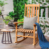 Outdoor rocking chair made of premium eucalyptus wood with slatted seat, perfect for patio relaxation.