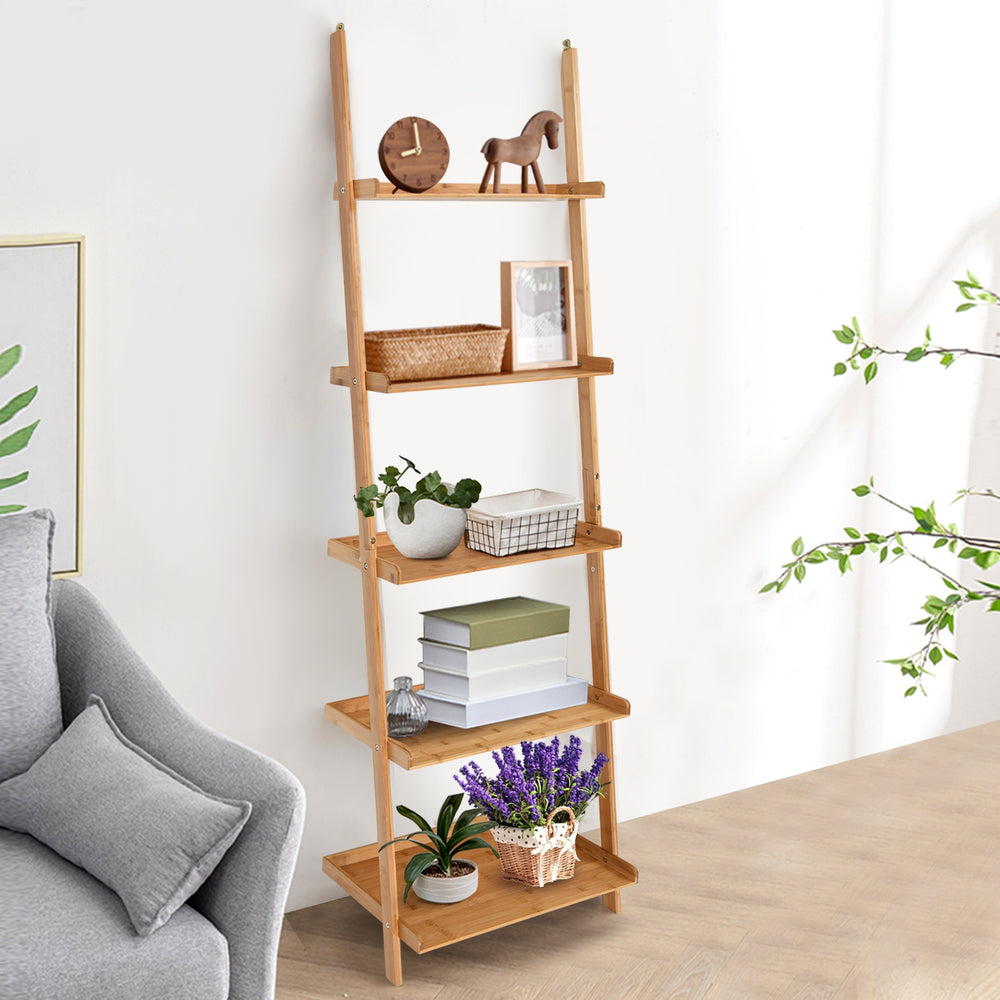 5-tier bamboo ladder shelf with wall-leaning design, perfect for organizing plants and books in any room.