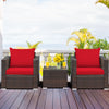 Red cushion patio sofa set with tempered glass table, made of durable rattan and steel, perfect for outdoor relaxation.