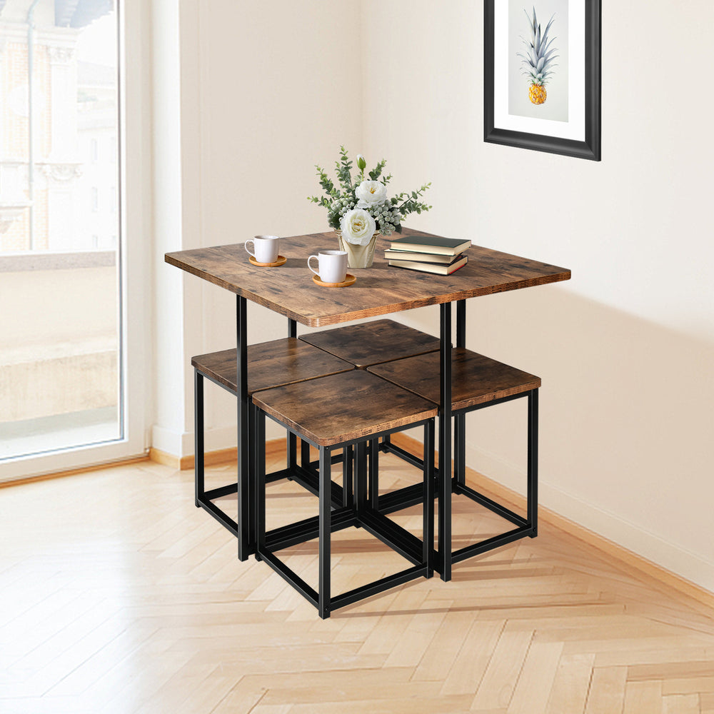 Compact dining set featuring a walnut table and four stools, perfect for small spaces like apartments and cafes.