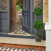 Artificial 36-inch double ball tree with UV protection, placed at an entrance for a touch of greenery and stability.