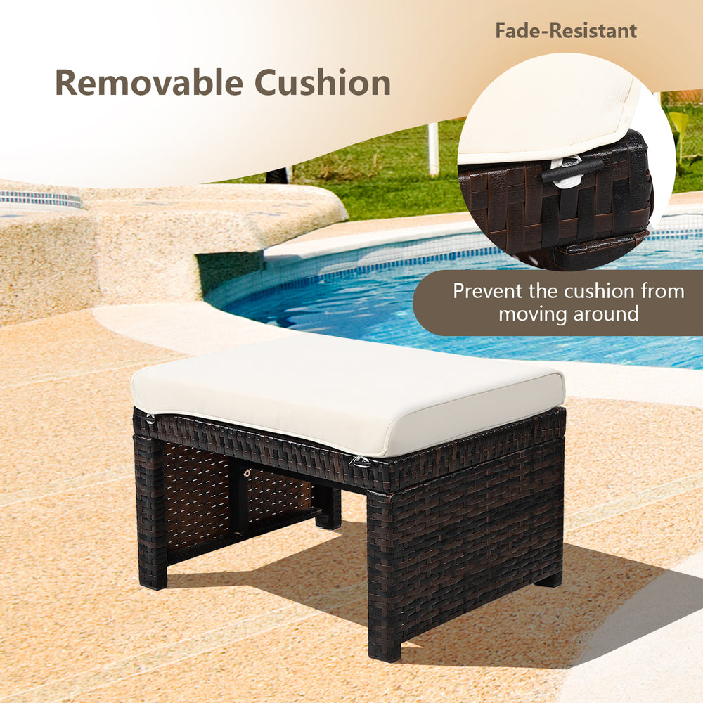 Patio rattan ottoman with removable white cushion, featuring a durable X-frame design for outdoor use and comfort.