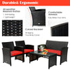 Four-piece patio rattan furniture set with red cushions, including loveseat, two chairs, and tempered glass coffee.
