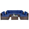 6-piece patio rattan furniture set with navy cushions and glass coffee table, ideal for outdoor relaxation.