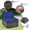 Single patio chair with navy cushion, made of weather-resistant PE rattan and sturdy steel frame, ideal for outdoor use.