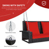 2-person patio rattan porch swing with red cushions, featuring sturdy metal chains for safe and stable swinging.