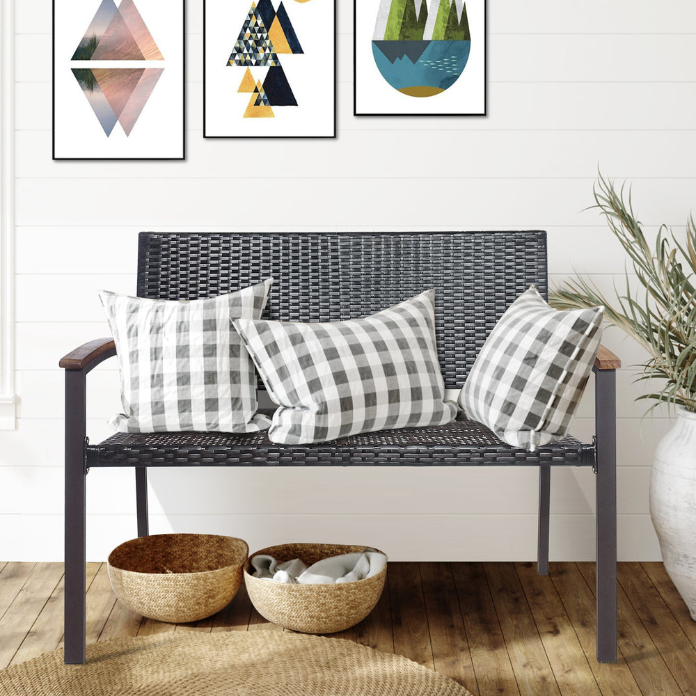 Outdoor patio rattan wicker bench with armrests, featuring gray PE rattan and solid acacia wood, perfect for garden.
