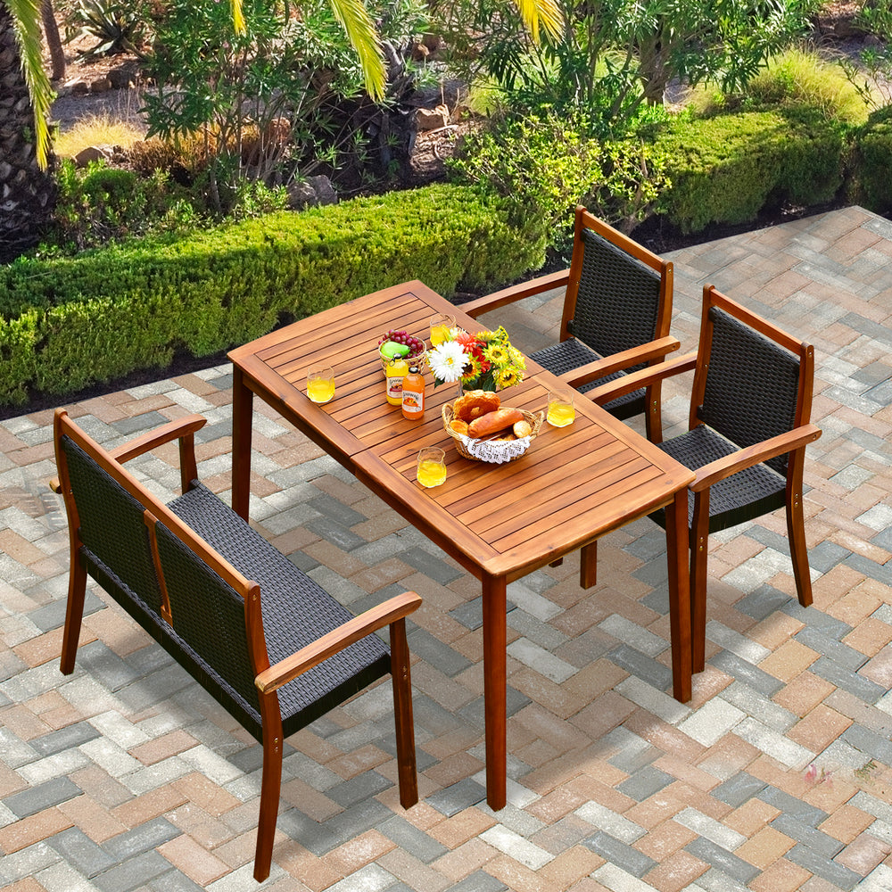 Acacia wood patio dining set with rattan chairs, featuring a spacious tabletop and umbrella hole, perfect for outdoor.