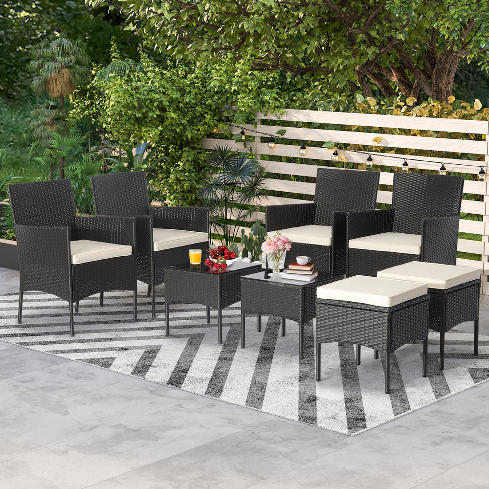 8-piece patio wicker conversation set featuring 4 chairs, 2 ottomans, and 2 coffee tables, perfect for outdoor.