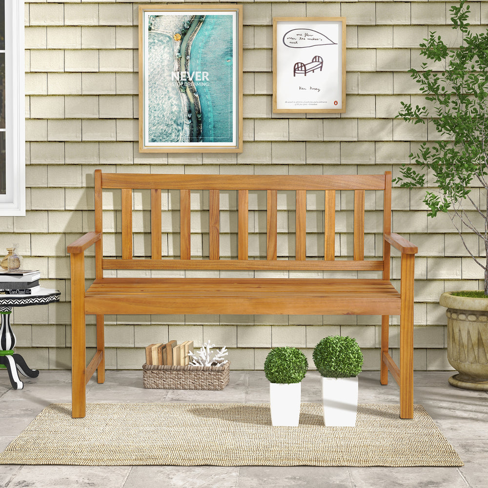 Acacia wood bench for 2 with backrest, featuring ergonomic armrests and slatted design, ideal for outdoor patios.