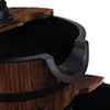 Close-up of the 2-tiers outdoor wooden barrel waterfall fountain showcasing the smooth carbonized wood and decorative.