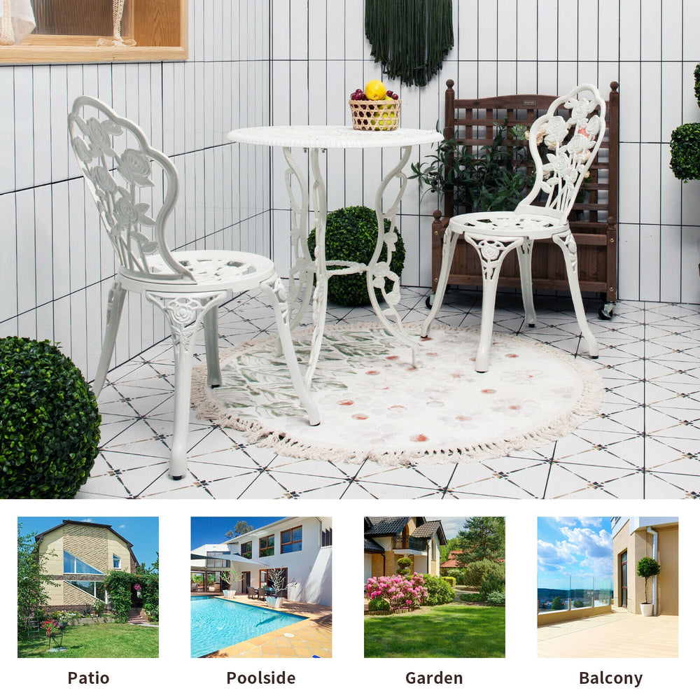 White outdoor cast aluminum patio furniture set with rose design, perfect for garden, balcony, or poolside relaxation.