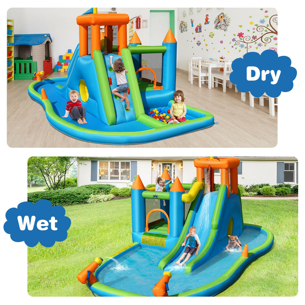 Inflatable water slide and bounce house with climbing wall, splash pool, and water cannons for outdoor fun.