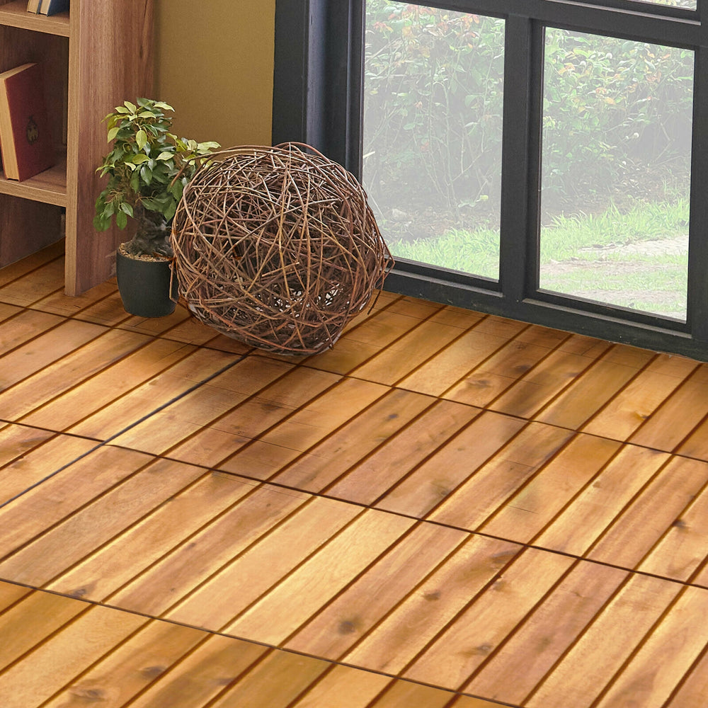 Acacia wood interlocking patio deck tiles shown on a wooden floor, ideal for indoor and outdoor flooring solutions.