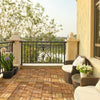 Acacia wood interlocking patio deck tiles arranged on a balcony, ideal for outdoor flooring and easy installation.