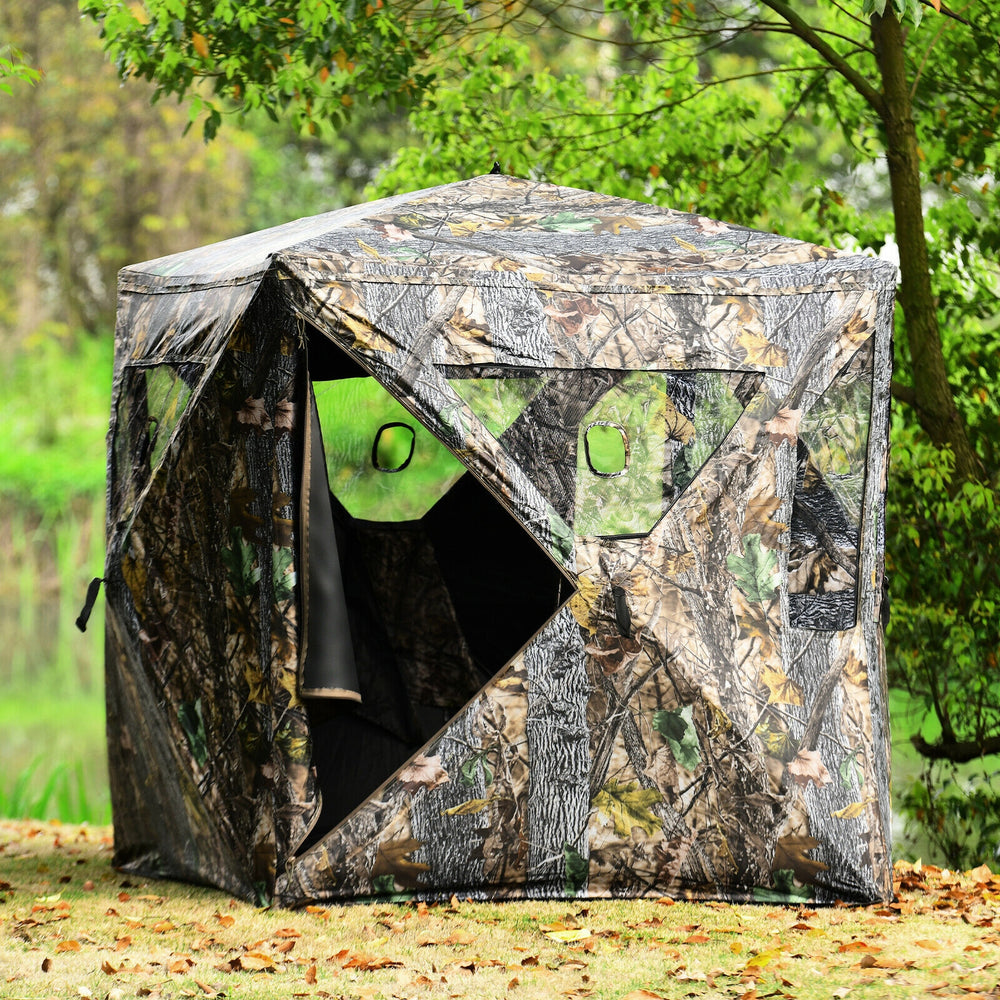 Portable 3-person hunting blind tent in camouflage, featuring gun ports and durable weather-resistant fabric for.