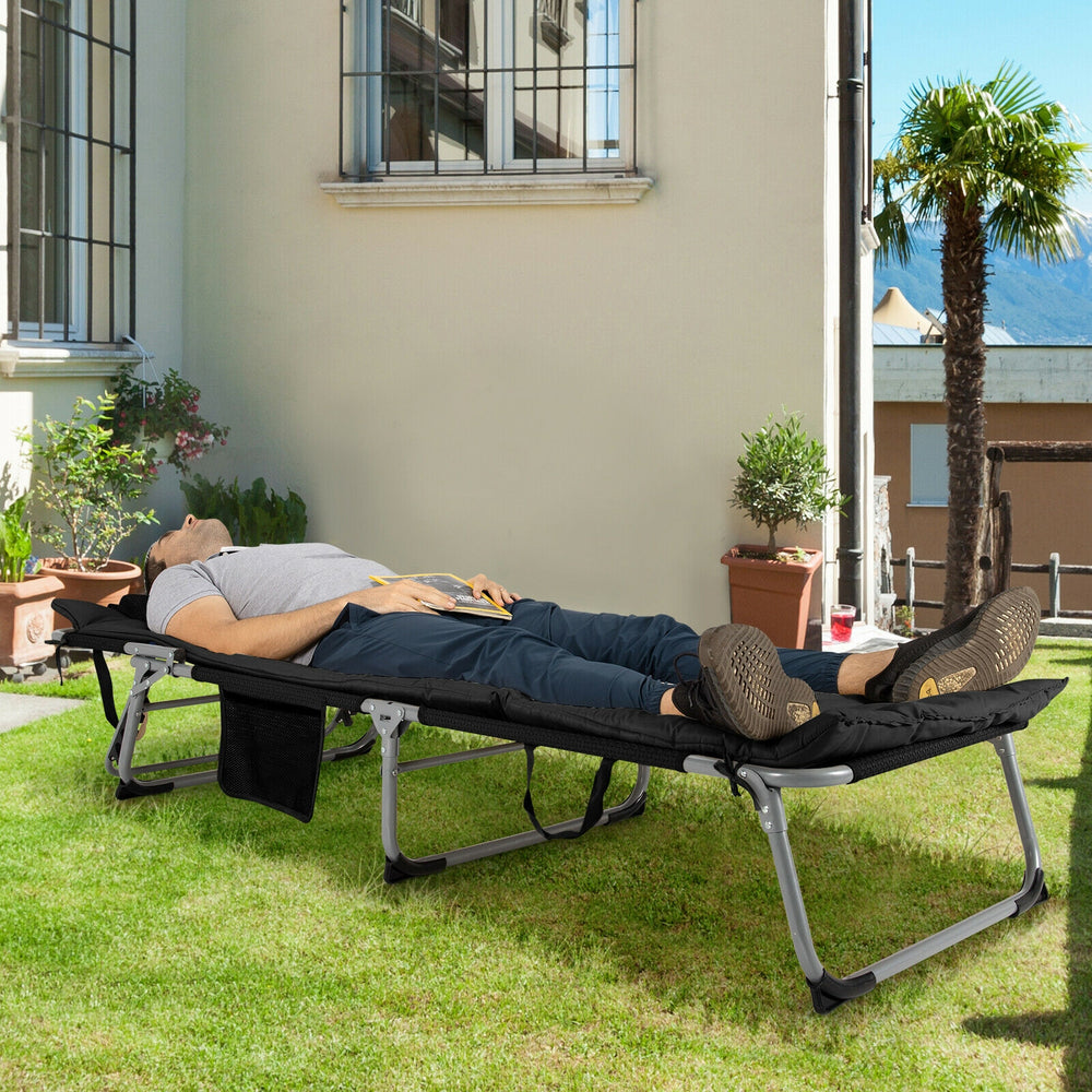 Oversize padded folding lounge chair in black, featuring a removable mattress, ideal for outdoor relaxation in gardens.