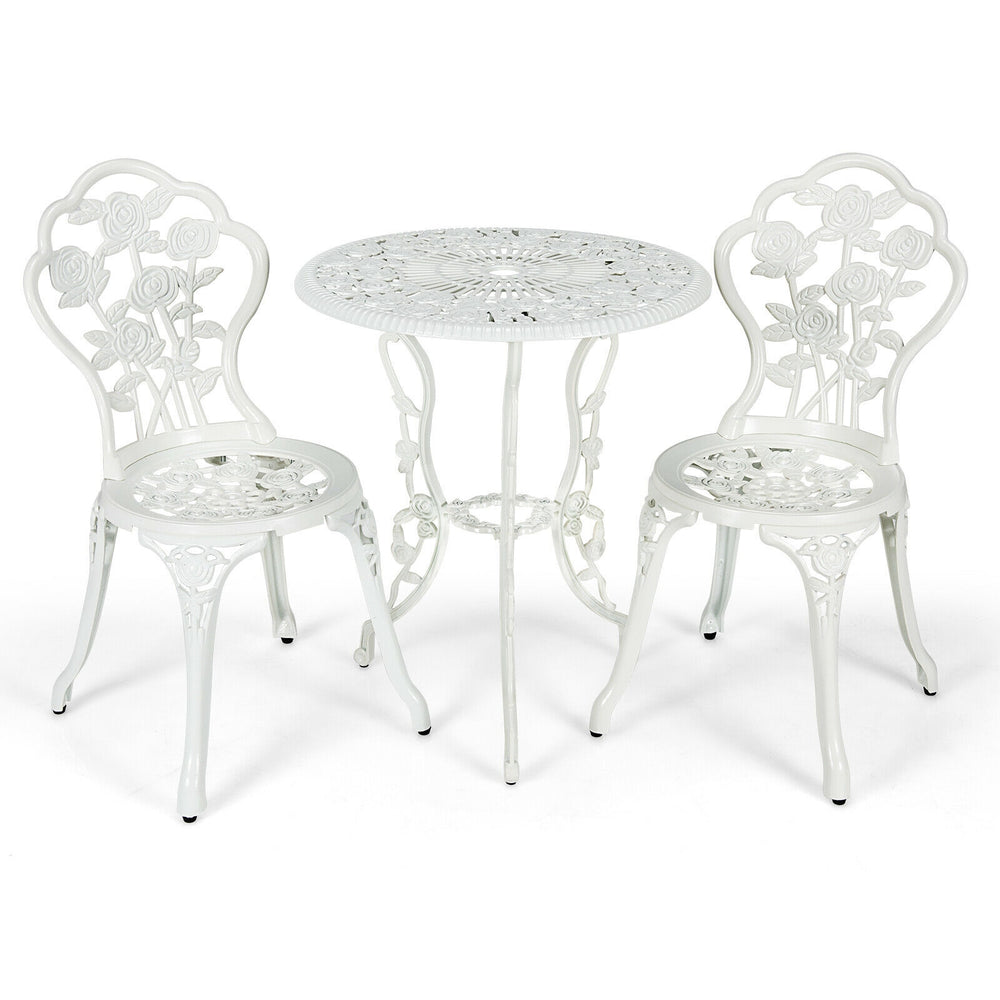 White outdoor cast aluminum patio furniture set with rose design, featuring a round table and two chairs for elegant.