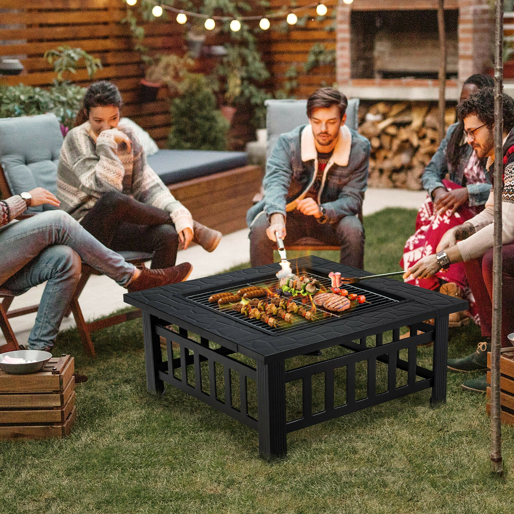 Multifunctional 32-inch outdoor fire pit table with BBQ grill, featuring a heat-resistant black coating for backyard.