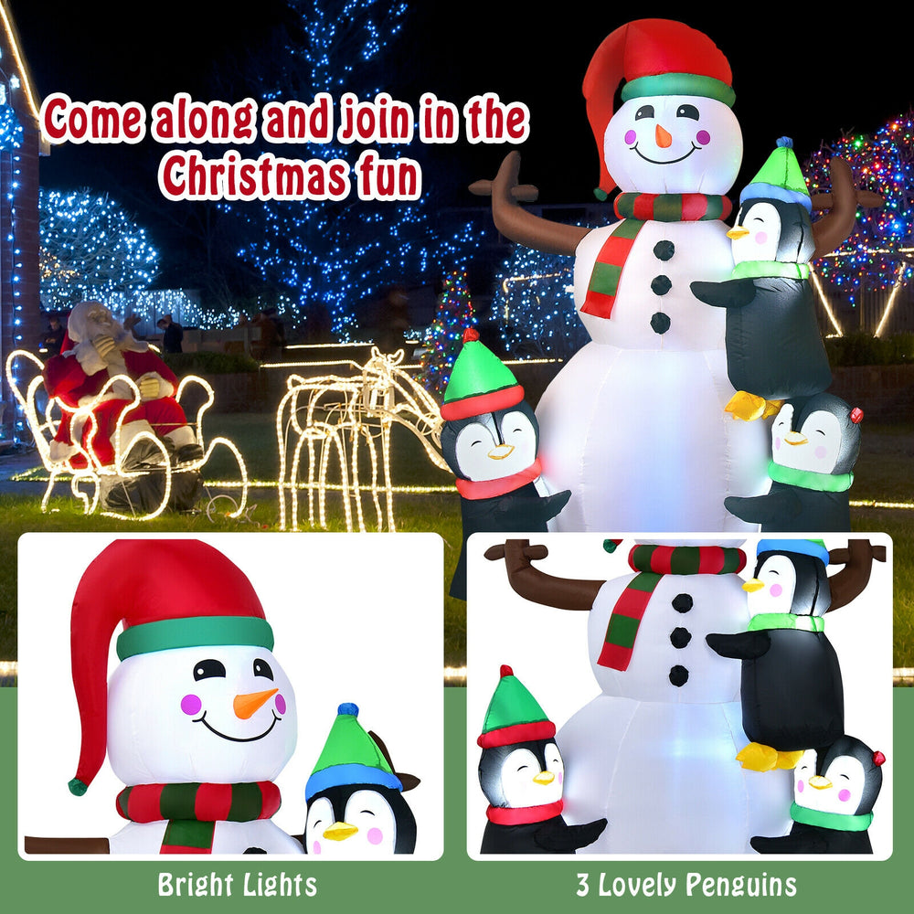 6ft inflatable Christmas snowman with 3 penguins, featuring bright lights, perfect for festive outdoor decoration.