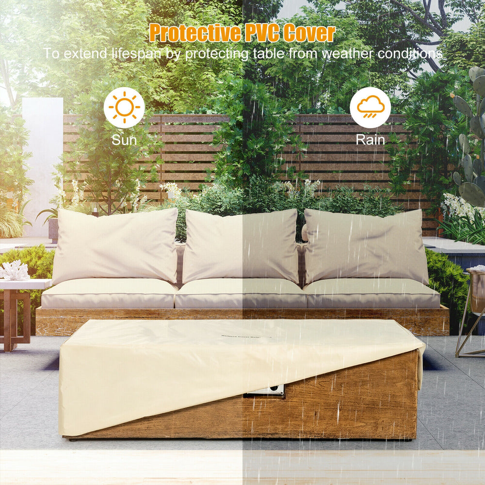 Outdoor propane fire pit table set with protective PVC cover, ideal for backyard gatherings and weather protection.