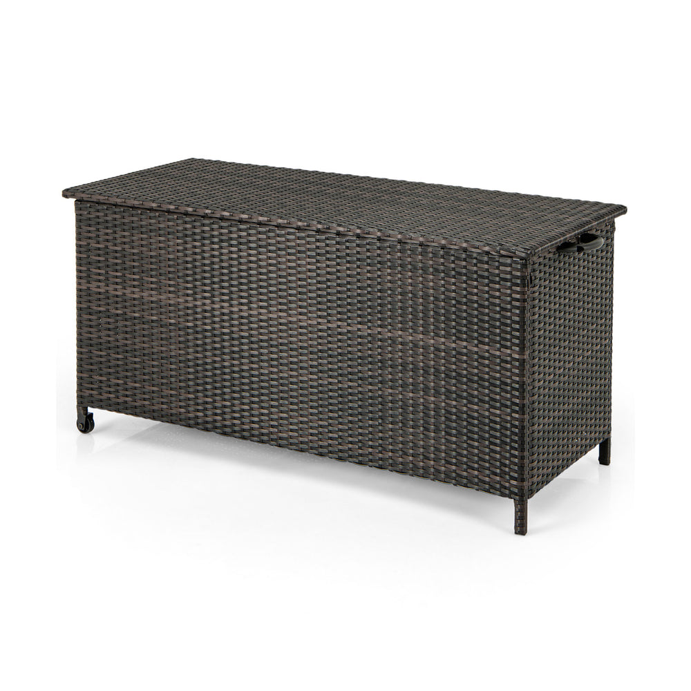 Brown 85-gallon storage container made of PE rattan with wheels, perfect for outdoor use on decks or porches.