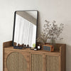 Rectangular wall mount bathroom mirror with rust-resistant steel frame, displayed on a wooden cabinet for versatile.