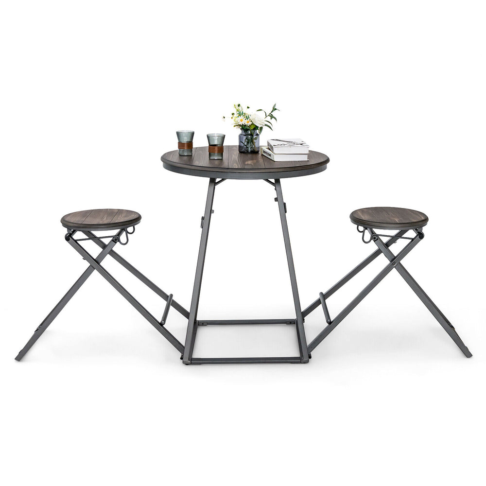 Round dining table set with 2 foldable stools in gray, made from MDF and sturdy steel, perfect for small spaces.