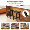 24-inch solid wood saddle-seat bar stools with curved surfaces and footrests, ideal for kitchens, cafes, and bars.