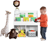 Kids wooden bookshelf organizer in white with 3-tier shelves and 2 open compartments for toys and books in a playroom.