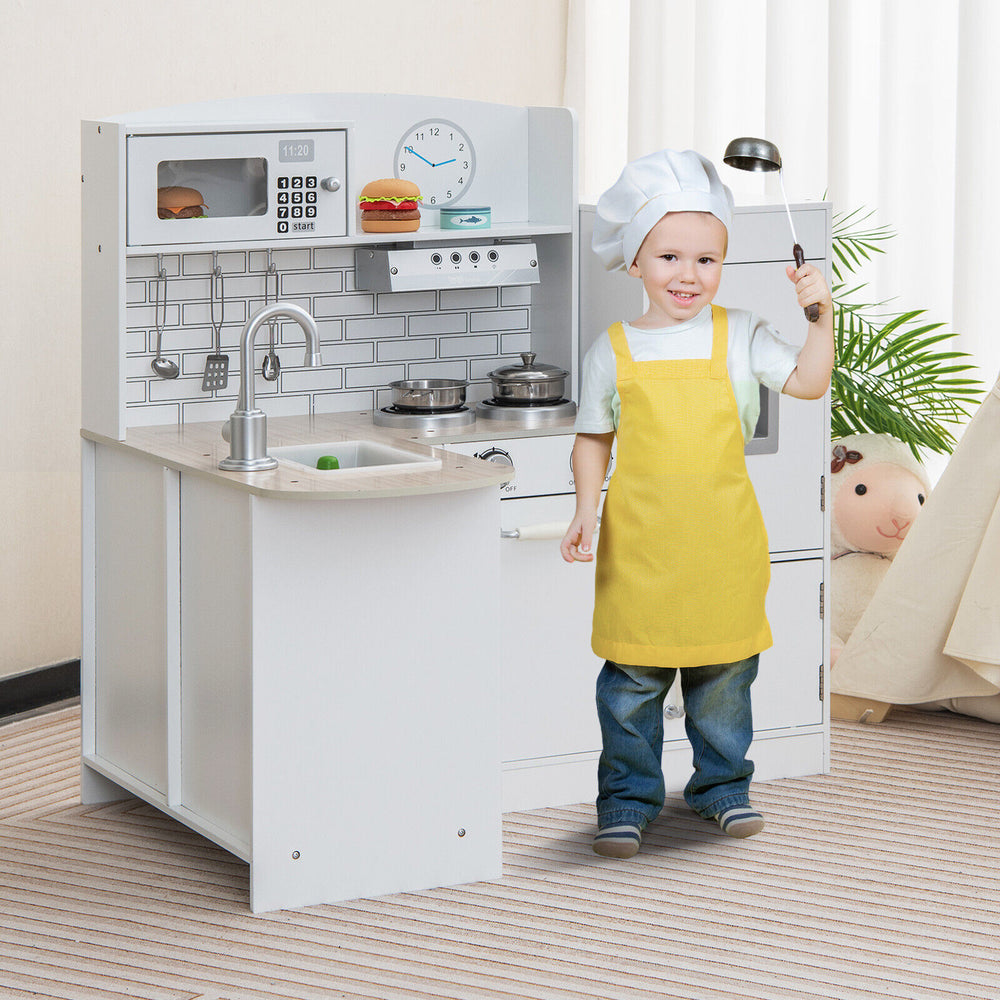 Kids kitchen playset with realistic microwave, oven, and sink, designed for imaginative cooking fun in white.
