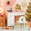 Kids vanity table set in white with cloud-shaped mirror, open shelf, and matching stool for bedroom or playroom use.