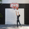 Large wall-mounted basketball hoop with shatter-proof backboard, ideal for improving skills and coordination.