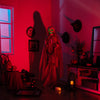 Lighted animated Halloween skeleton decoration with LED lights, sound effects, and chilling details for outdoor use.