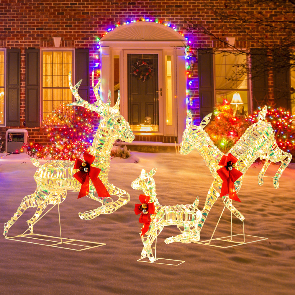 Lighted Christmas reindeer family with bows, featuring 230 LED lights for festive outdoor decoration in winter.