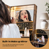Lockable freestanding jewelry organizer with built-in makeup mirror and LED lights for convenient storage and elegance.