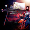 Multifunctional K-shaped gaming desk with cup holder, headset hook, and ergonomic curved front for comfortable gaming.