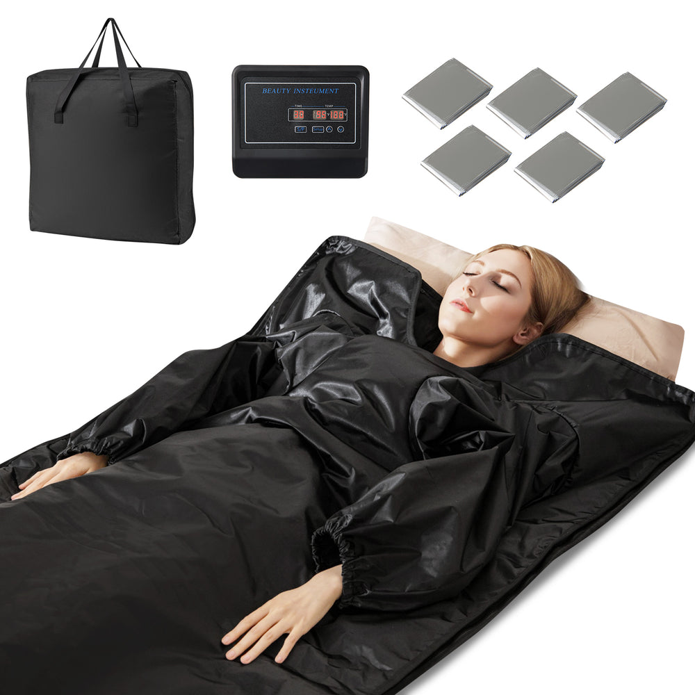 Infrared sauna blanket in black with arm sleeves, carry bag, and five disposable wraps for home relaxation and detox.