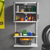 Metal wall cabinet with lock and adjustable shelves, featuring tools and cleaning supplies for organized storage.