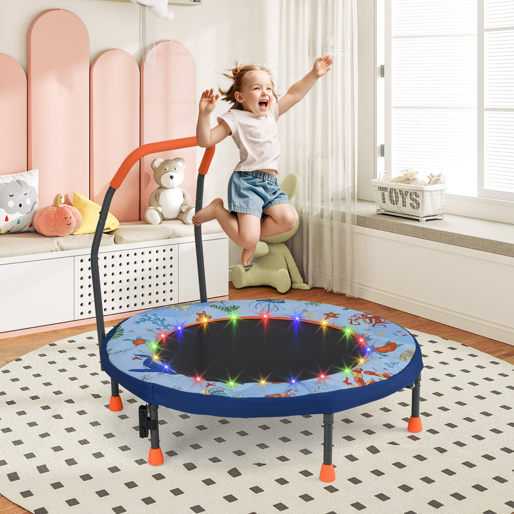Mini trampoline for kids with LED lights, padded safety cover, and foam handrail, perfect for active play indoors.