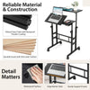Mobile stand-up computer desk in black with adjustable tilting desktops, sturdy steel frame, and wheels for easy.