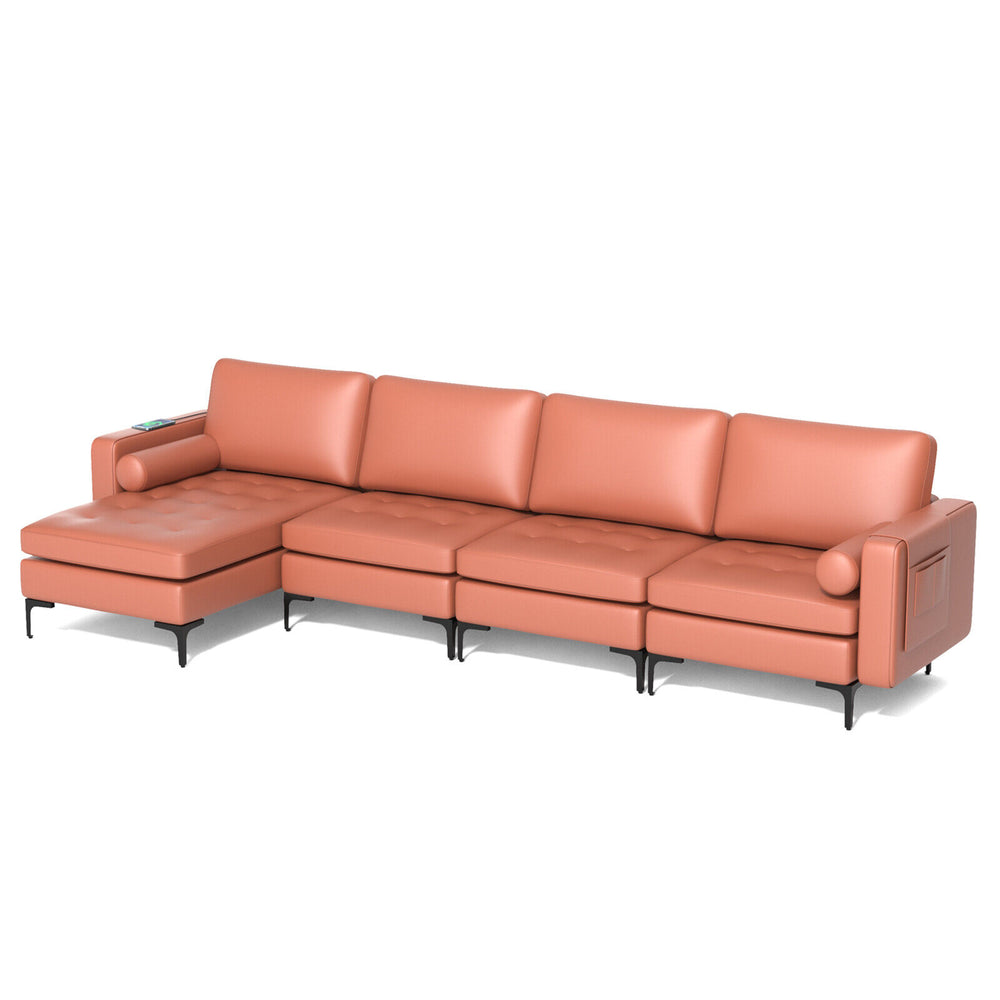Modular L-shaped 4-seat sectional sofa in pink with reversible chaise, USB ports, and soft back pillows for comfort.