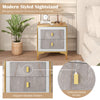 Modern nightstand with elegant marble pattern, two pull-out drawers, and sturdy metal legs for bedroom or living room.