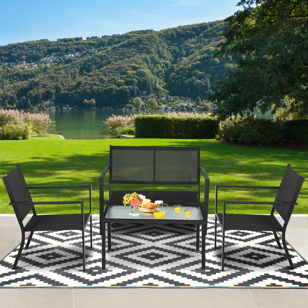 4-piece gray patio furniture set with a steel frame, including a coffee table and ergonomic chairs, perfect for outdoor.