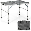 Folding aluminum grill table with iron mesh top, adjustable height, and compact design for outdoor camping and picnics.